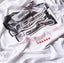 White t-shirt with black and red graphics and text on a white background